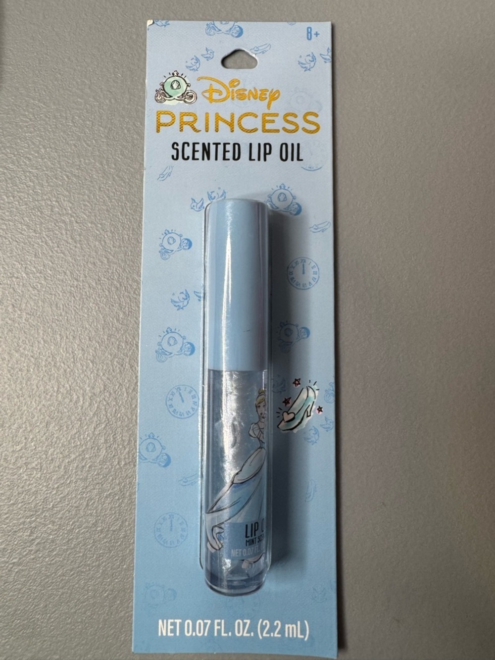 Disney Princess Cinderella themed Scented Lip Oil pastel blue glass shoe carriag